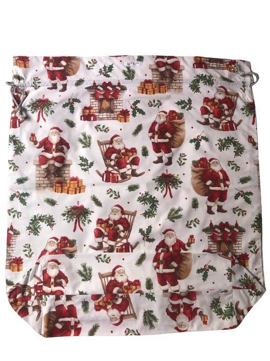 Sac à cadeaux blanc père Noël
